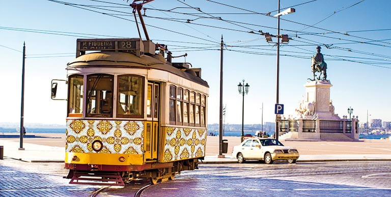 A vintage wooden tram in Commerce Square, Lisbon